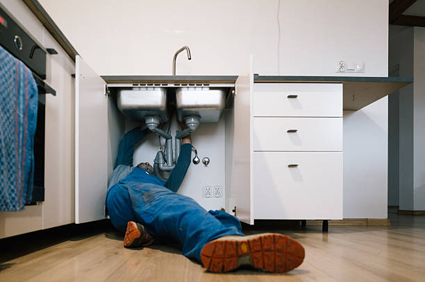 Professional Plumbing technician working in Groveton, TX